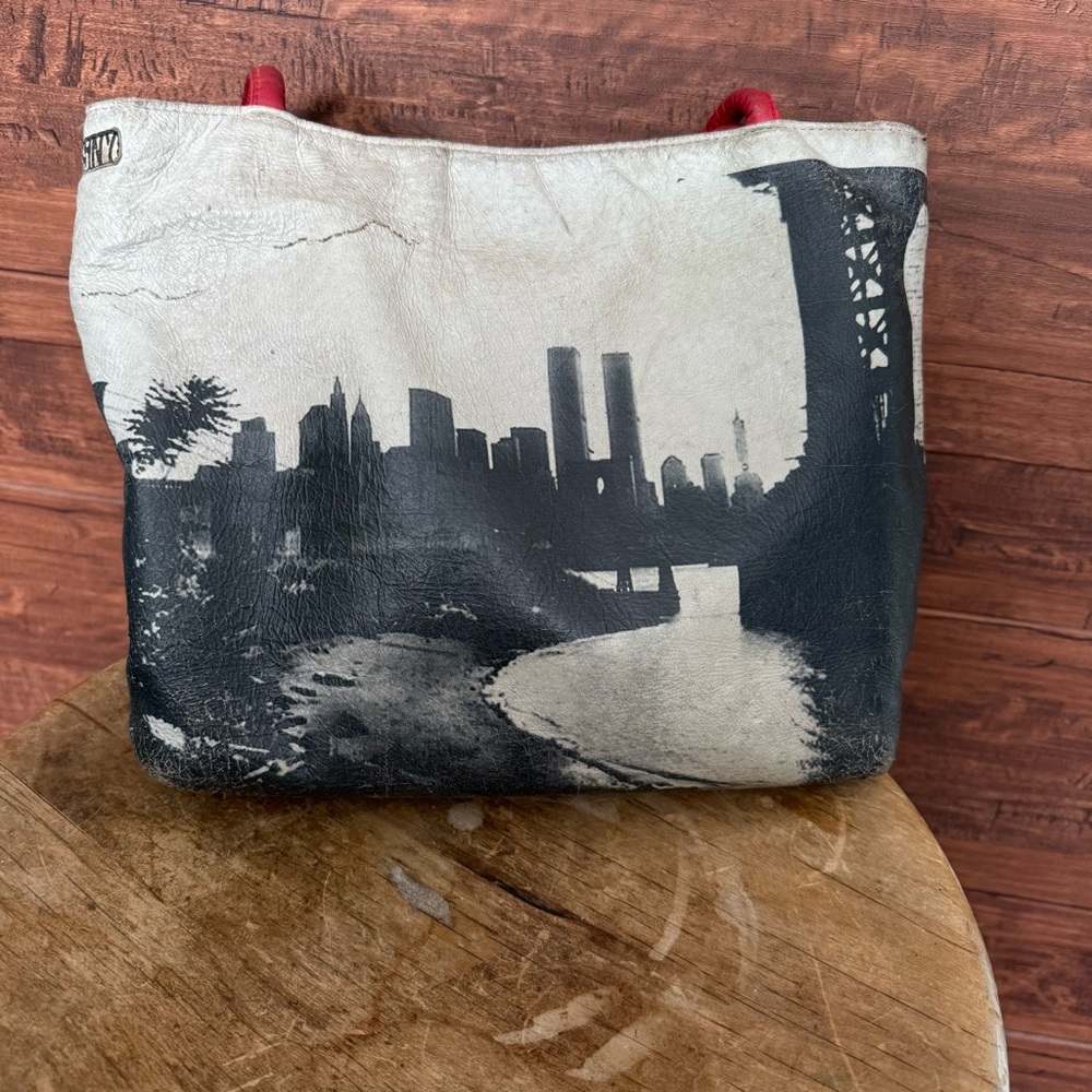 Purchased in NYC gallery
Shows some wear 
Fun purse